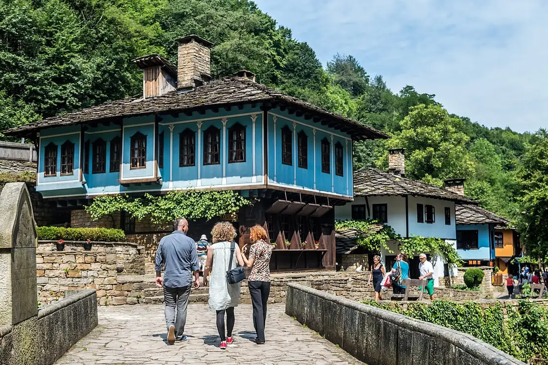 Traditional wooden craft houses along the street of the Etar open-air ethnographic museum
