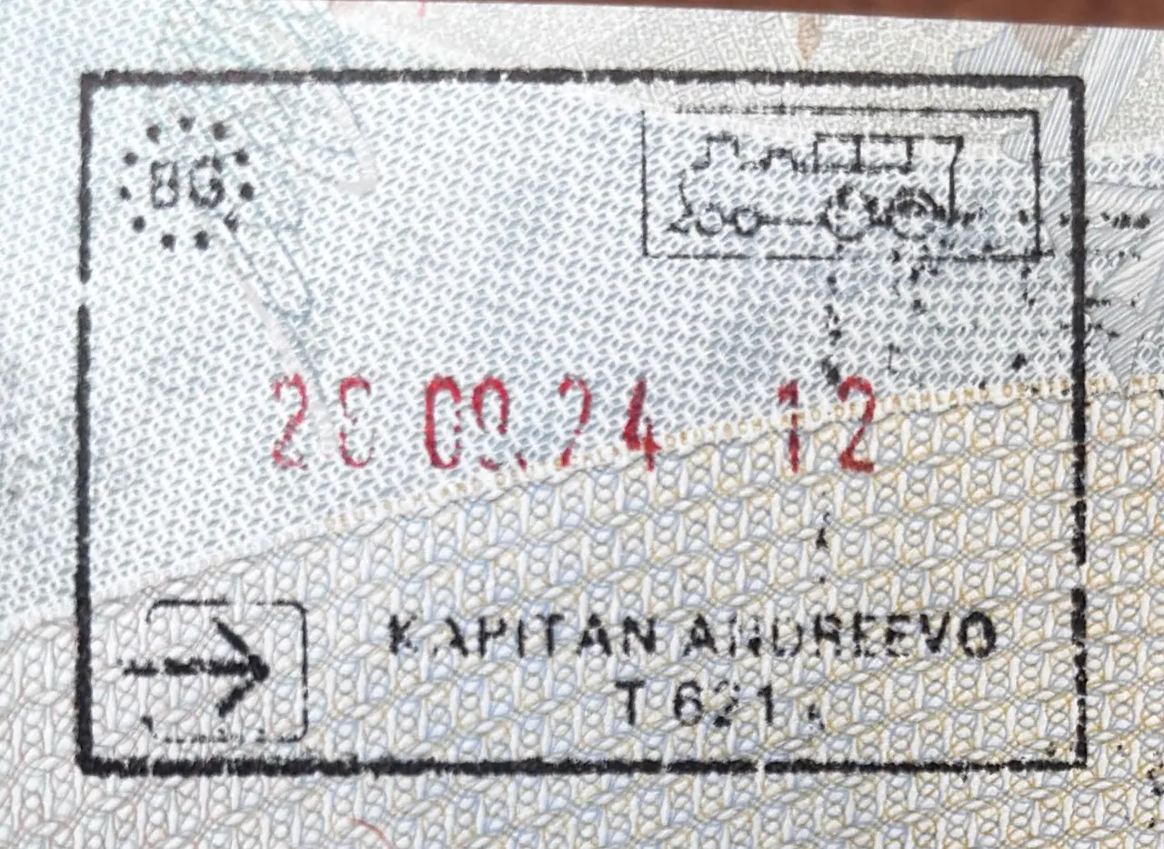 A Bulgarian entry passport stamp from the Kapitan Andreevo crossing, a rectangular ink stamp with a train symbol and the date