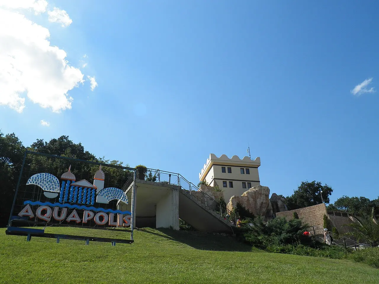 The Moorish-style towers and pools of Aquapolis water park above Golden Sands