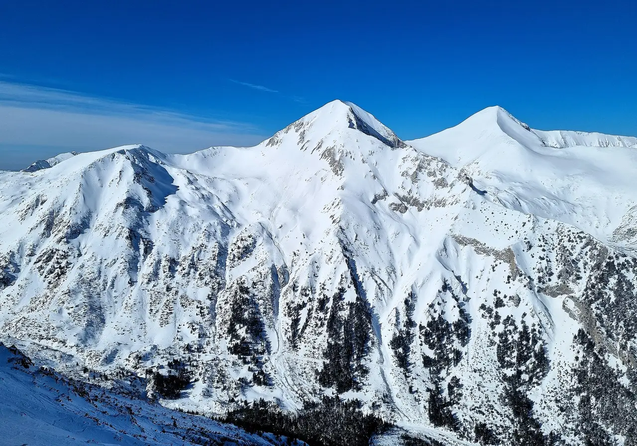 The rocky summit of Vihren in the Pirin mountains, the second-highest peak in Bulgaria, seen against a clear sky