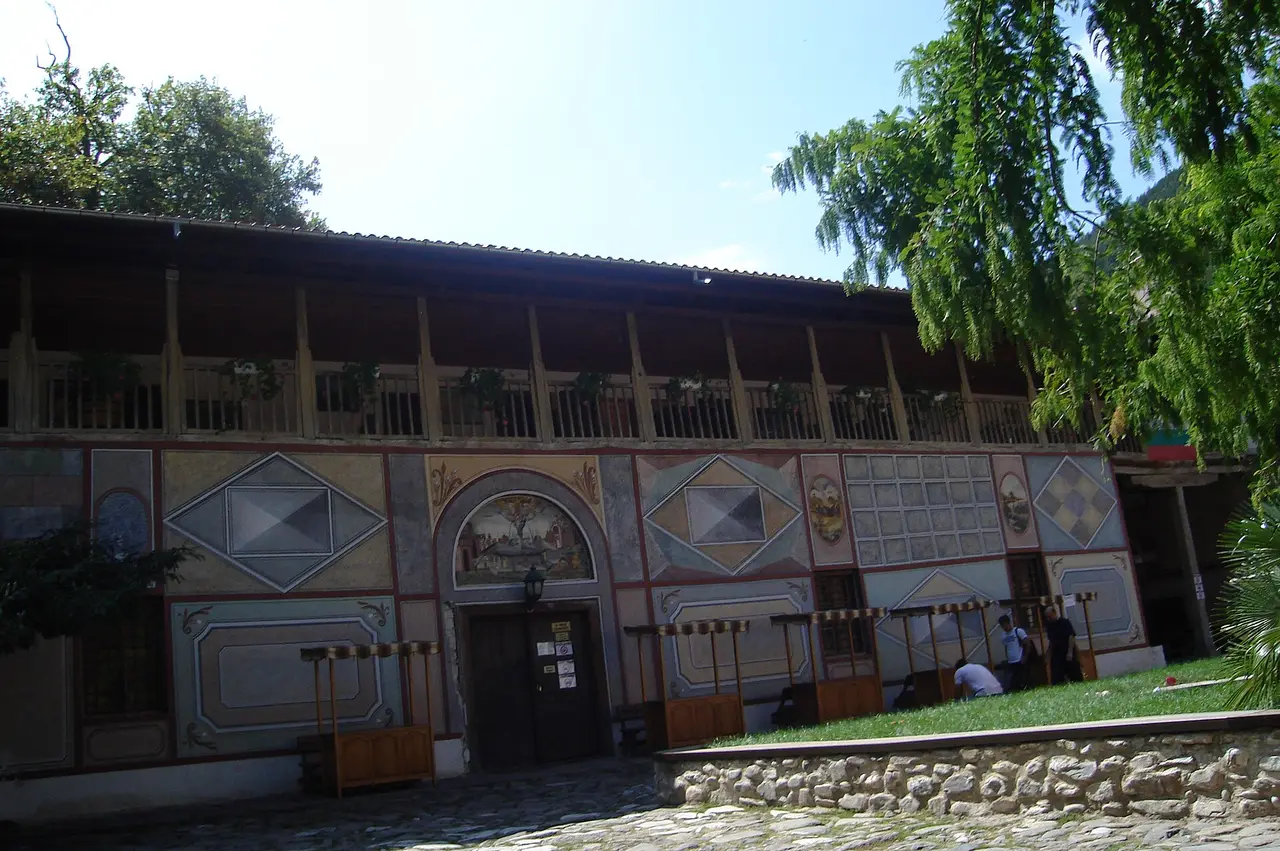 The painted outer wall and wooden gallery of the refectory wing at Bachkovo Monastery