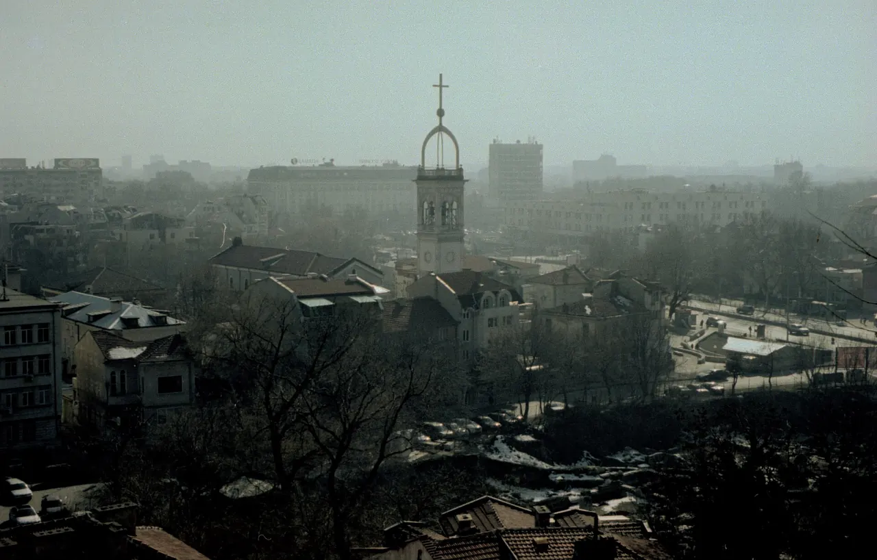 Red roofs of Plovdiv old town spreading below the hills toward the Thracian plain