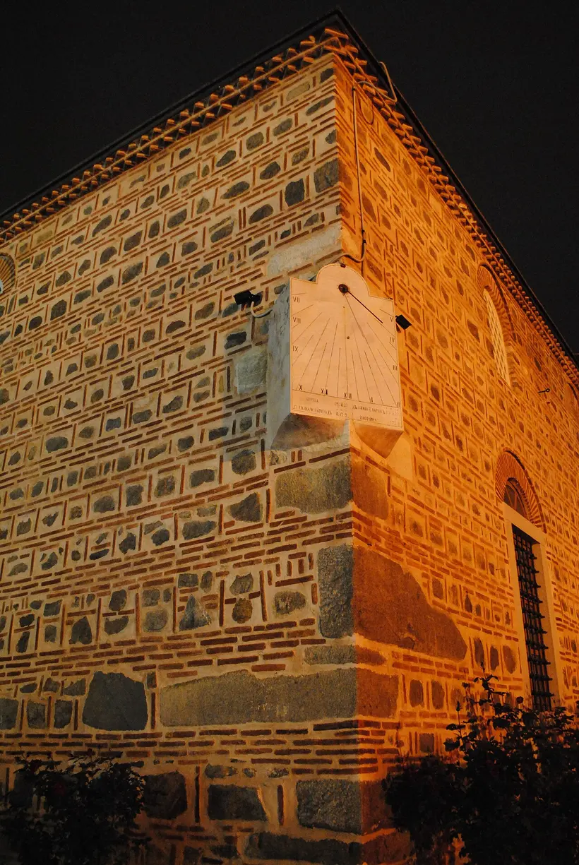 Dzhumaya Square in central Plovdiv lit up at night with the Ottoman mosque and cafes