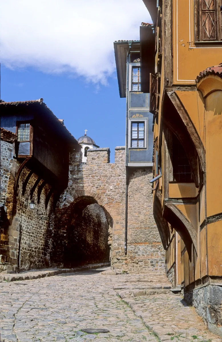 A steep cobbled lane between Revival houses in the Old Town of Plovdiv
