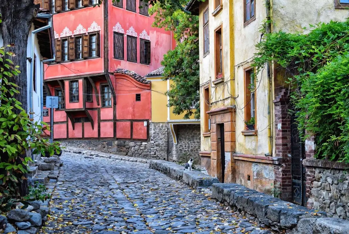 A cobbled street in Plovdiv's Old Town lined with painted Revival houses