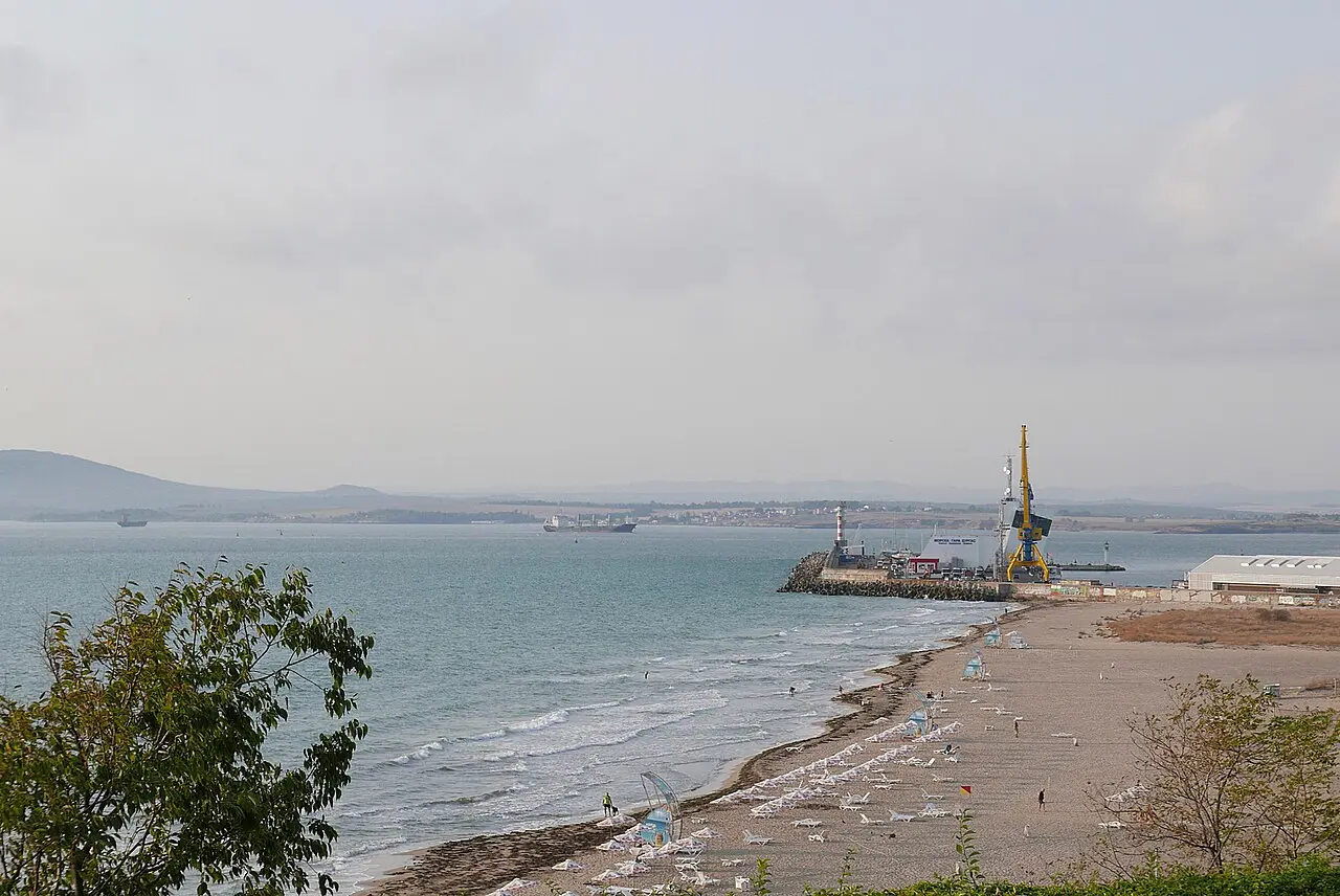 The Black Sea off Burgas under a wide sky, with a ship on the horizon