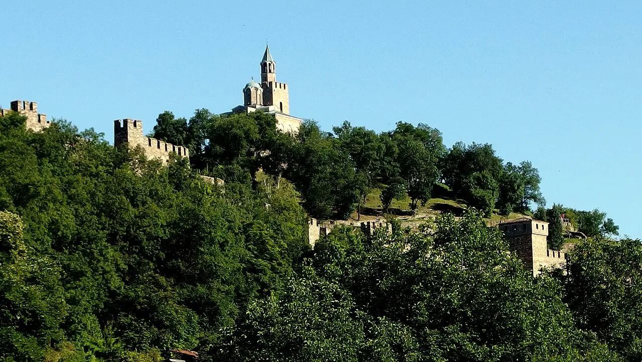 Tsarevets fortress and the houses of Veliko Tarnovo climbing the hillside above the Yantra river