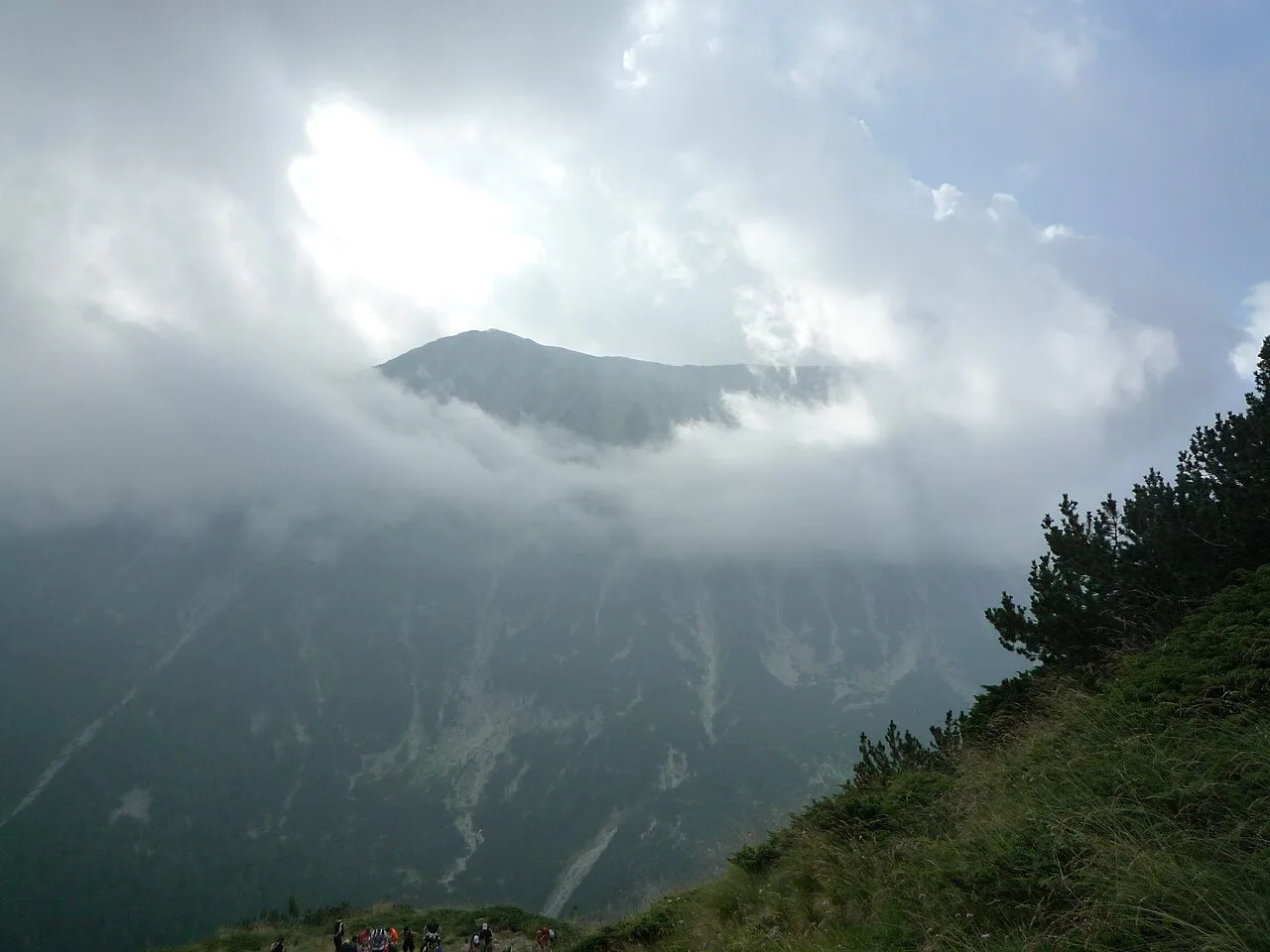 The ski slopes and Todorka peak above Bansko under snow, with lifts on the mountain