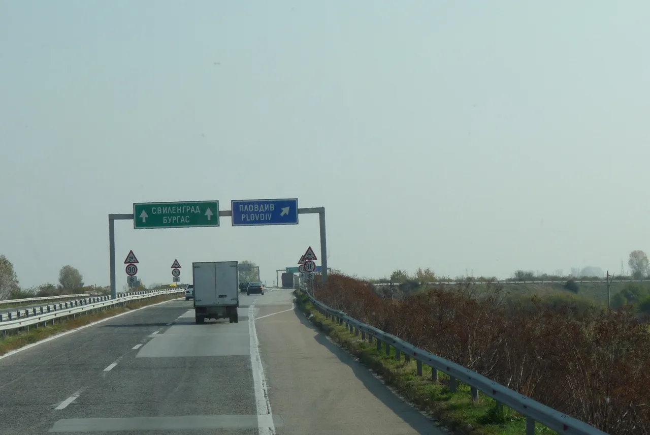 The A1 Trakia motorway running straight towards Plovdiv across open country with hills in the distance