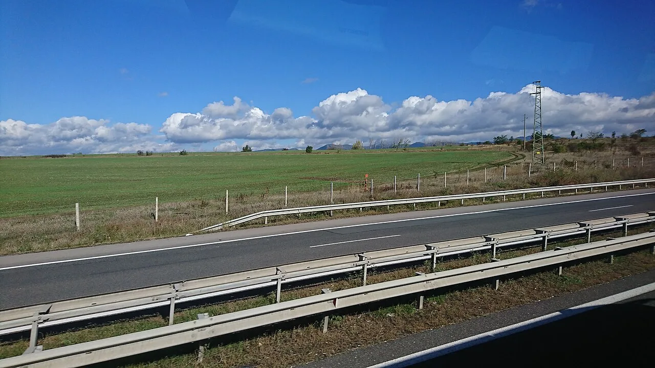 The A2 Hemus motorway curving through green hills on the way east from Sofia