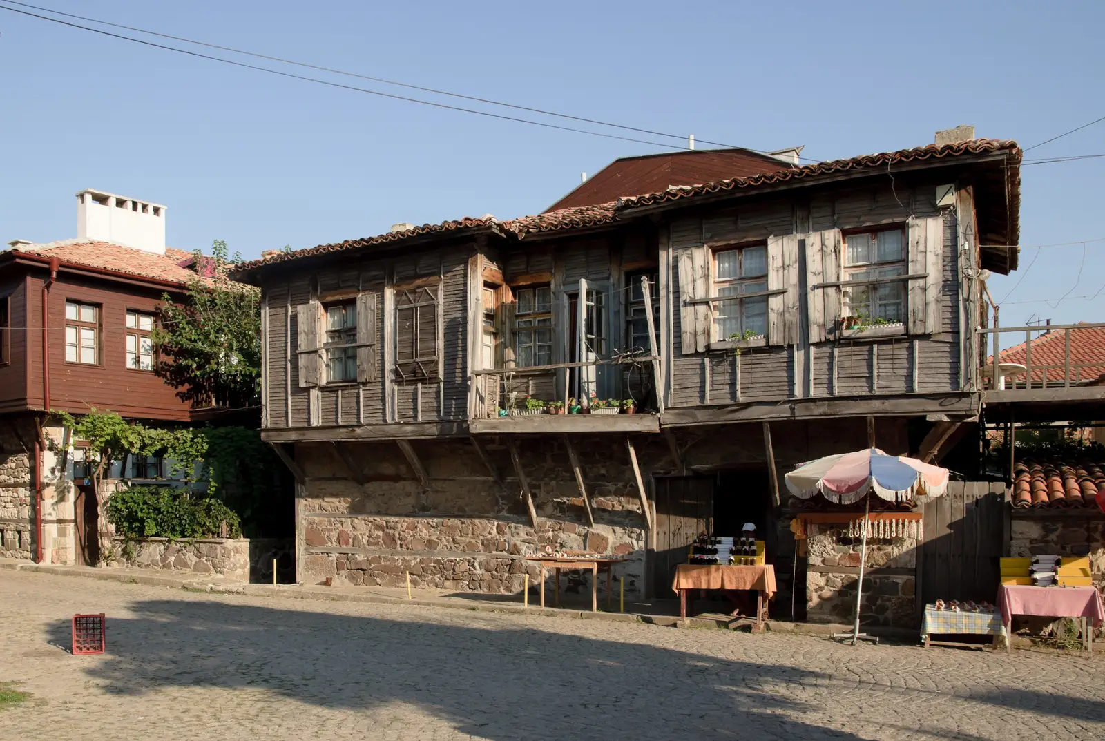 The red-roofed old town of Sozopol packed onto its rocky peninsula above the Black Sea, seen from across the water
