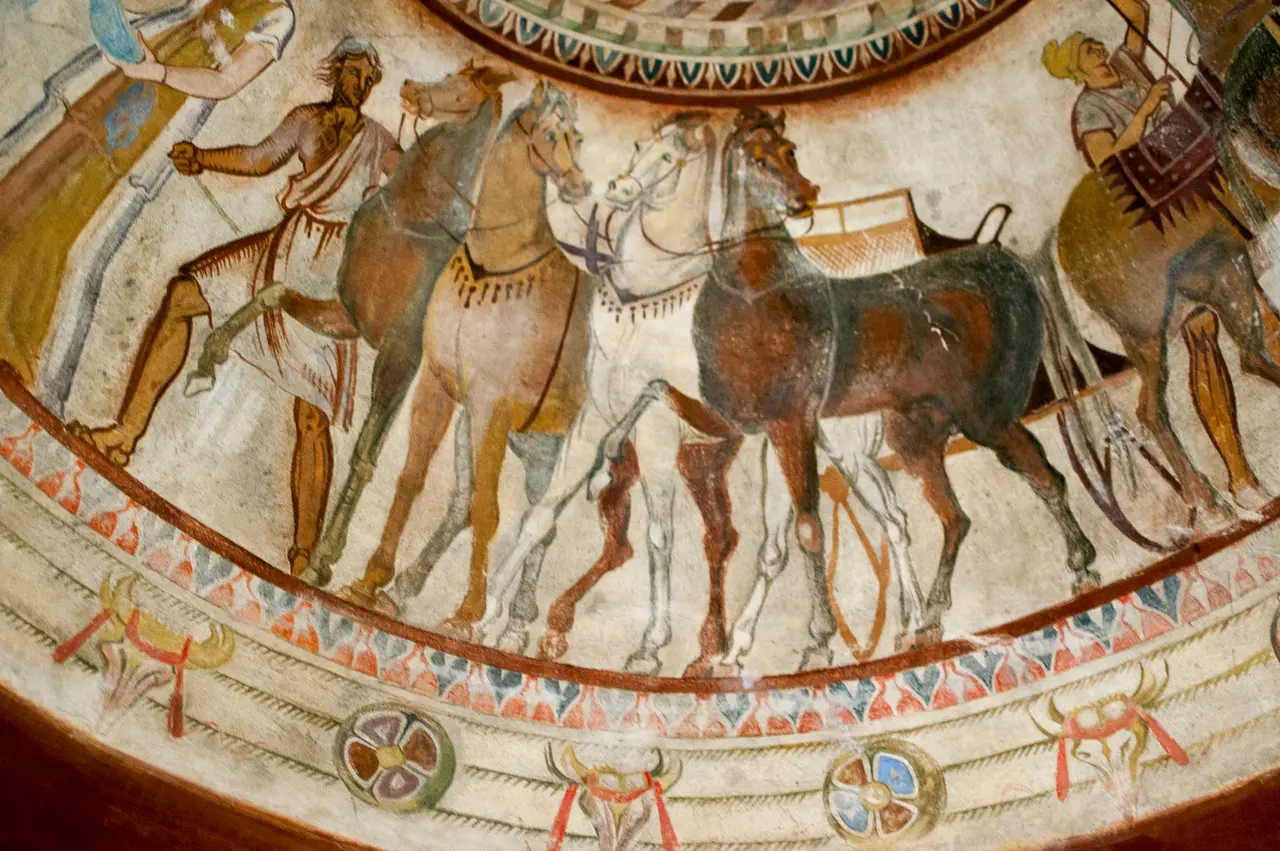 Painted frieze of horses, a chariot and attendants running around the domed ceiling of the Thracian tomb of Kazanlak