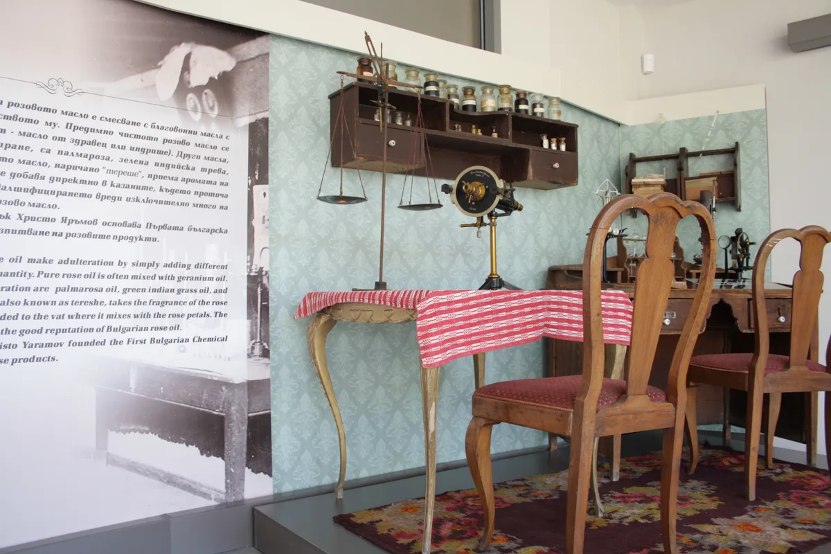 Historic rose oil testing laboratory display with glassware and instruments at the Museum of Rose in Kazanlak