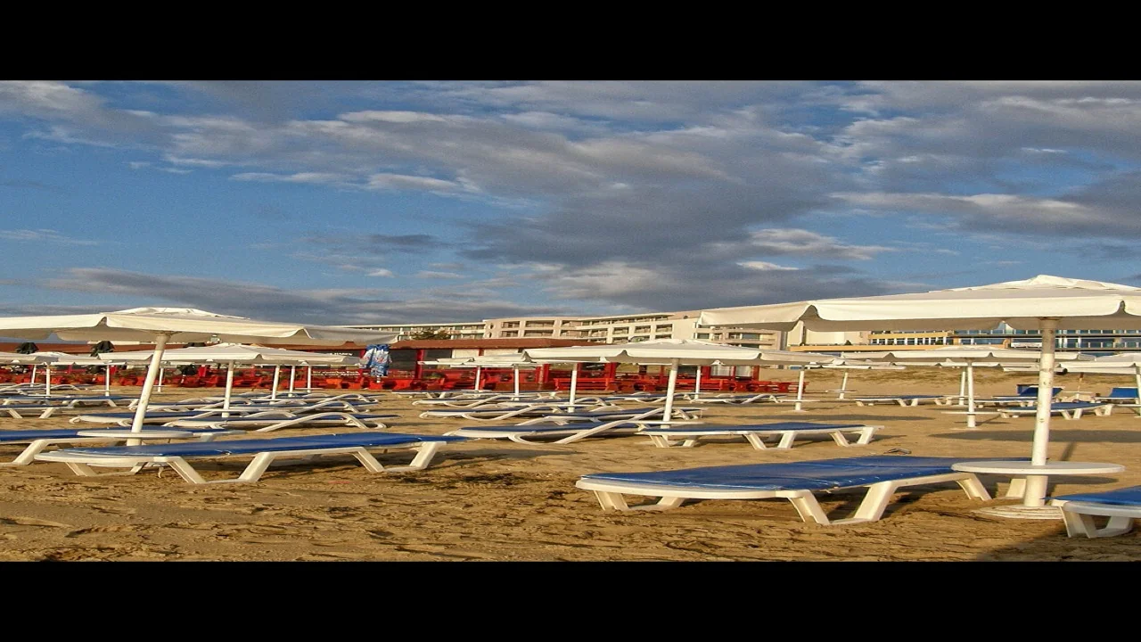 Sandy beach and hotel strip at Sunny Beach on the Bulgarian Black Sea coast under a clear sky