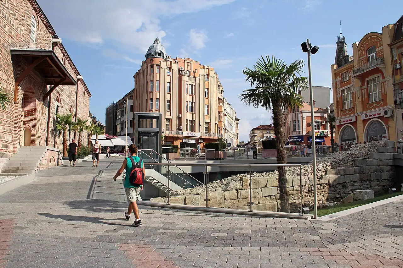 Dzhumaya Square in central Plovdiv with the Ottoman mosque, clock tower and the sunken Roman stadium