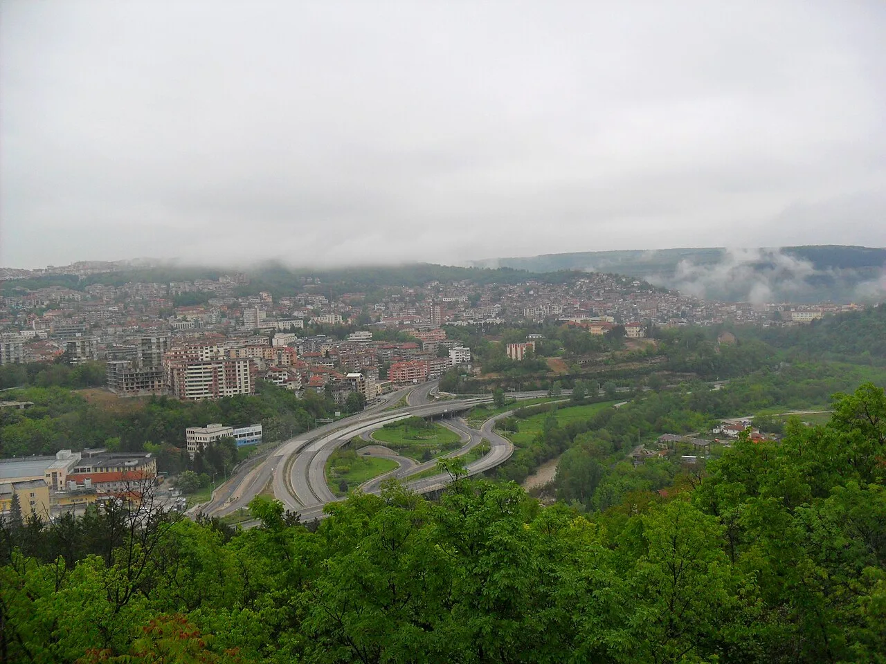 Panorama of Veliko Tarnovo with houses stacked up both sides of the Yantra river gorge
